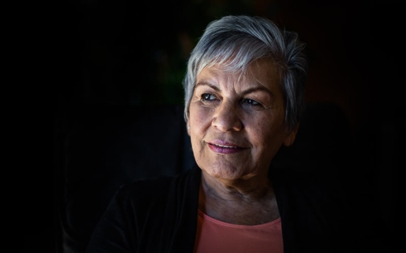 Close up of woman with short greying hair
